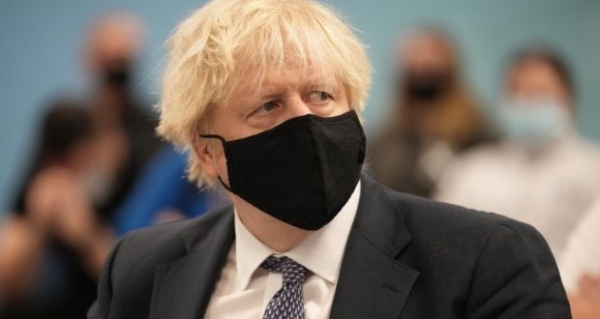Johnson announces new Covid restrictions as he apologises for Downing Street video